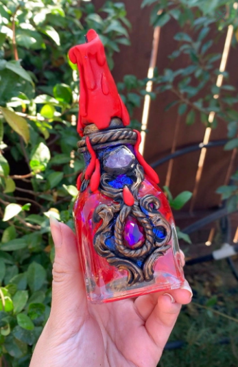 Red elixer spell bottle